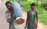 Bahrains PM moved by Indian man who carried his wifes corpse, donates money to family